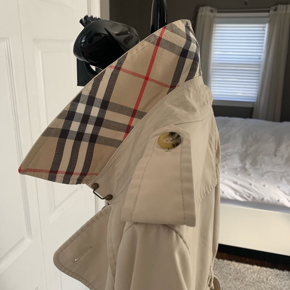 Burberry knee length, double breasted trench coat, beige